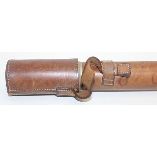 769A - An early 20th century Negretti & Zambra telescope with leather case , 