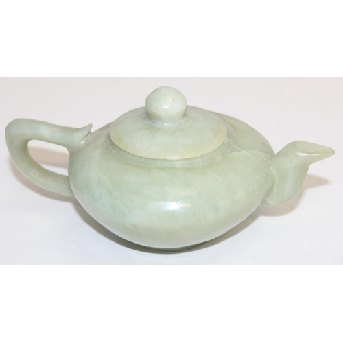 1516 - A Chinese carved green hardstone teapot believed to be Jade, likely 20th century, approx 15cm wide