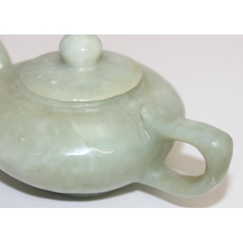 1516 - A Chinese carved green hardstone teapot believed to be Jade, likely 20th century, approx 15cm wide