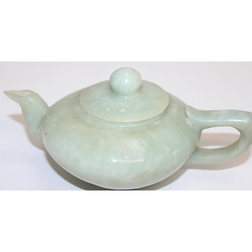 1516 - A Chinese carved green hardstone teapot believed to be Jade, likely 20th century, approx 15cm wide