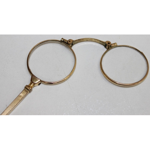 1538 - A pair of antique gold plated folding lorgnettes, 1/20th 14k gold, and a pair of antique folding pin... 