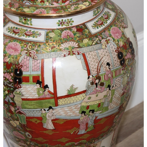 1564 - A very large Chinese porcelain temple jar or vase on wooden stand, Famille Rose palette, mid-late 20... 