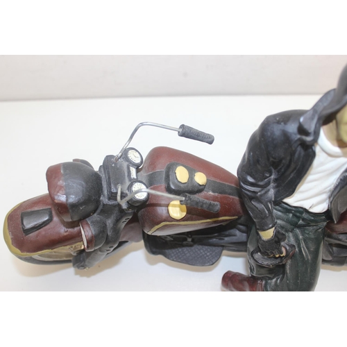 1600 - Vintage style composition model of Harley Davidson and rider with turning wheels, approx 50cm W x 32... 