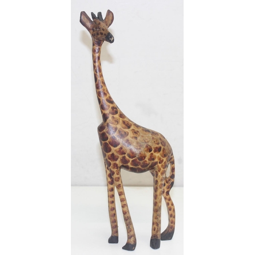 1602 - Large wooden carved sculpture of a Giraffe, approx 100 cm tall and a similar smaller example