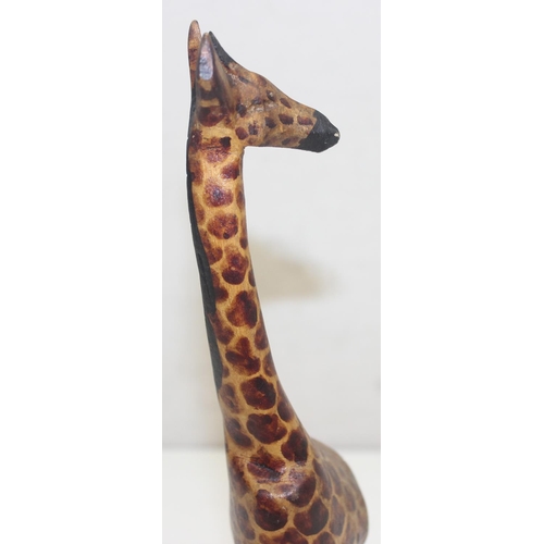 1602 - Large wooden carved sculpture of a Giraffe, approx 100 cm tall and a similar smaller example