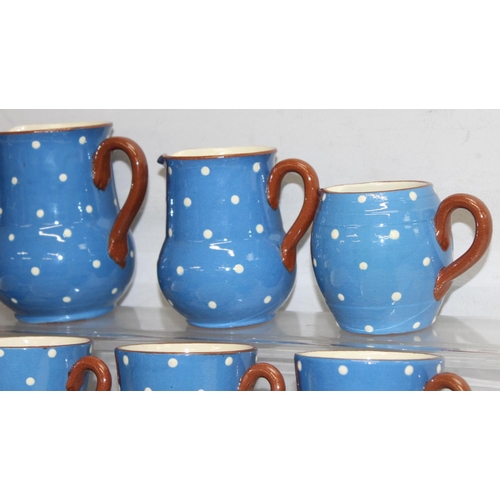 16141634 - Qty of Watcombe Tourquay Pottery items in blue with white spots, to incl teapot, cups, saucers, plat... 