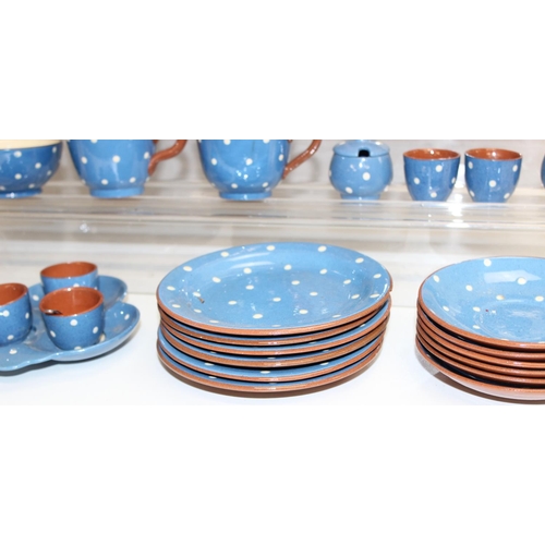 16141634 - Qty of Watcombe Tourquay Pottery items in blue with white spots, to incl teapot, cups, saucers, plat... 