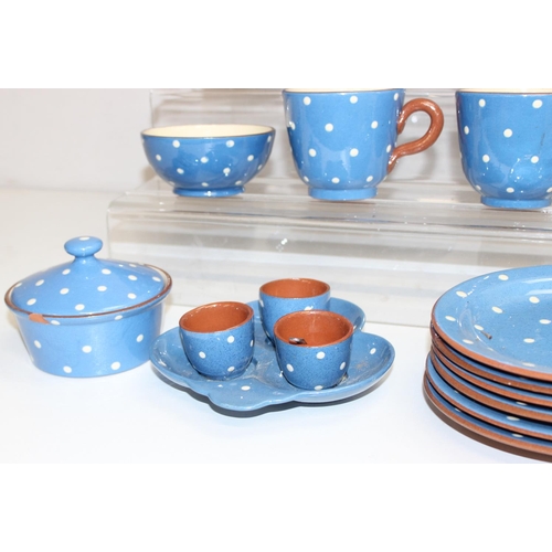 1614 - Qty of Watcombe Tourquay Pottery items in blue with white spots, to incl teapot, cups, saucers, plat... 