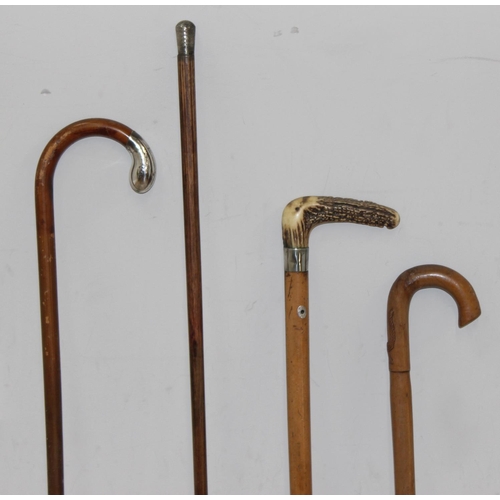 1619 - 4 vintage walking sticks/canes to incl a silver collared example, longest approx 104cm