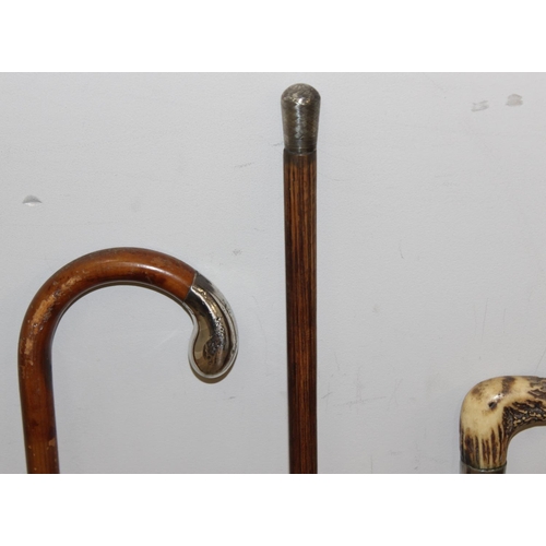 1619 - 4 vintage walking sticks/canes to incl a silver collared example, longest approx 104cm