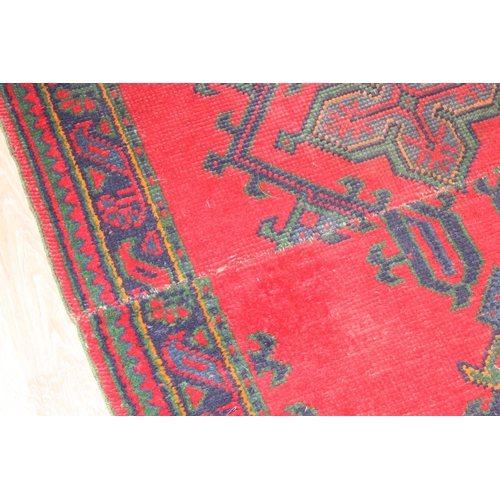 200 - Vintage red runner rug believed to be a Turkish Oushak rug, part repaired, approx 264cm x 100cm