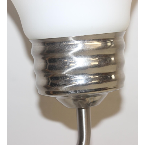 231 - A retro style lamp in the form of a lightbulb on chrome base, approx 48cm tall