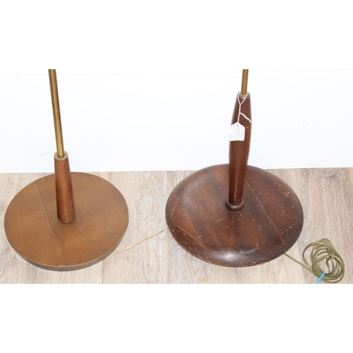 236 - 2 retro wooden and brass standard lamps, the tallest approx 150cm