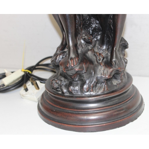 239 - Bronzed classical style lamp with classical lovers decoration, approx 79cm tall