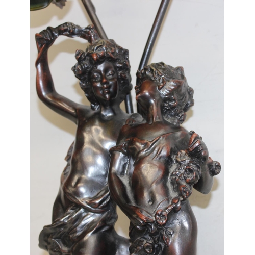 239 - Bronzed classical style lamp with classical lovers decoration, approx 79cm tall