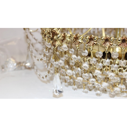 243 - Vintage 2-tier brass and crystal chandelier, approx 35cm H