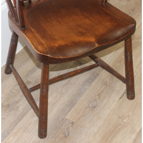 150 - An antique style farmhouse Windsor style hoop and stick back armchair, approx 100cm tall