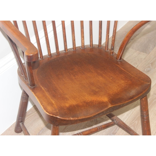 150 - An antique style farmhouse Windsor style hoop and stick back armchair, approx 100cm tall