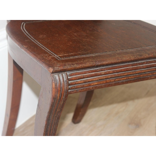 131 - In the manner of Gillows, a 19th century mahogany hall chair with shell shaped carved back, approx 8... 