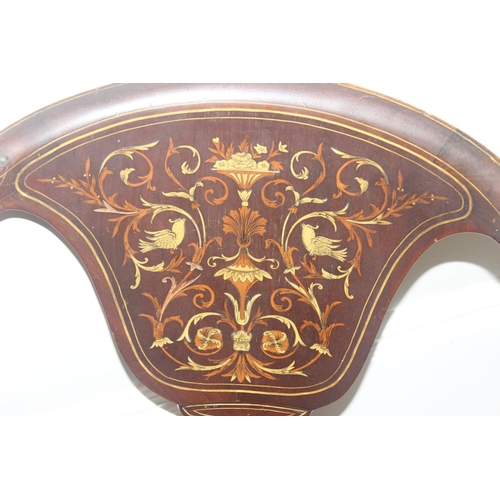 134 - A 19th century inlaid mahogany tub chair in the manner of James Shoolbred, with profuse marquetry in... 