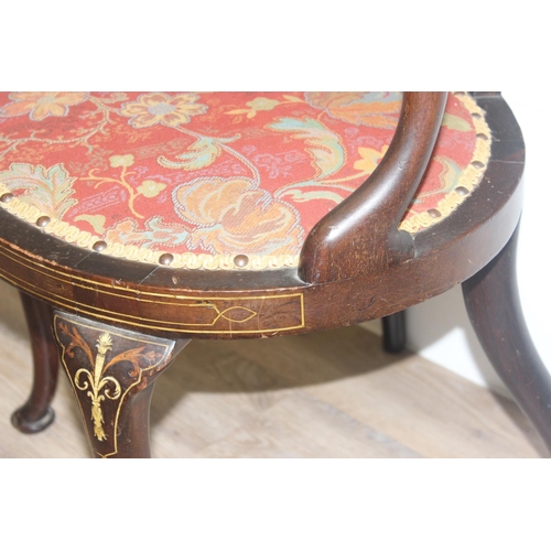 134 - A 19th century inlaid mahogany tub chair in the manner of James Shoolbred, with profuse marquetry in... 