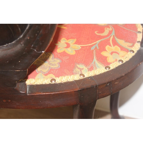 134 - A 19th century inlaid mahogany tub chair in the manner of James Shoolbred, with profuse marquetry in... 