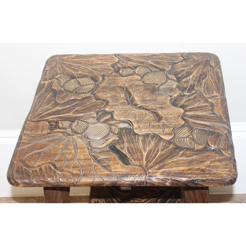 104 - An Arts and Crafts or Aesthetic Movement period carved side table in the Japanese manner, likely ret... 