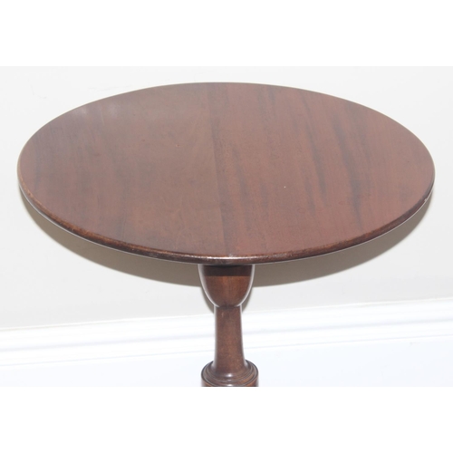 132 - An antique mahogany wine table on splayed legs and a small button back low slipper chair, the table ... 