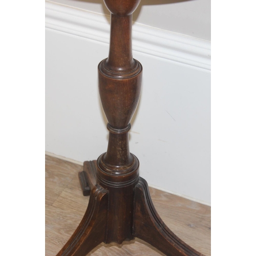 132 - An antique mahogany wine table on splayed legs and a small button back low slipper chair, the table ... 