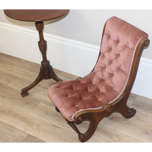 132 - An antique mahogany wine table on splayed legs and a small button back low slipper chair, the table ... 