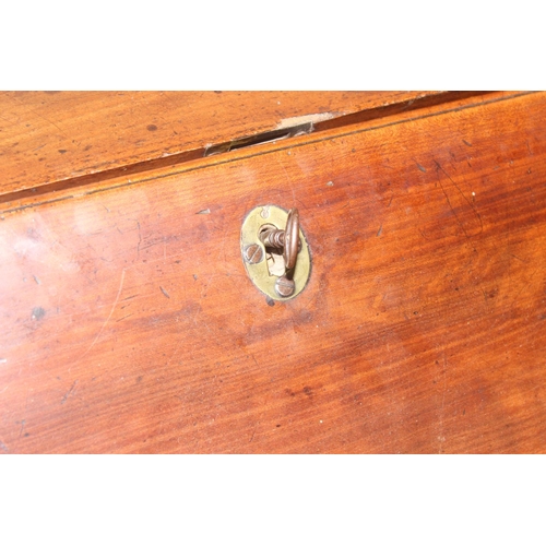 129 - A Georgian mahogany bureau with fitted interior, 4 long drawers with brass drop handles and bracket ... 