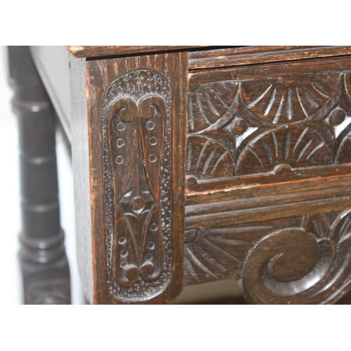 172 - A Jacobean or Carolean style carved oak hall or console table, likely early 20th century, with 2 dra... 