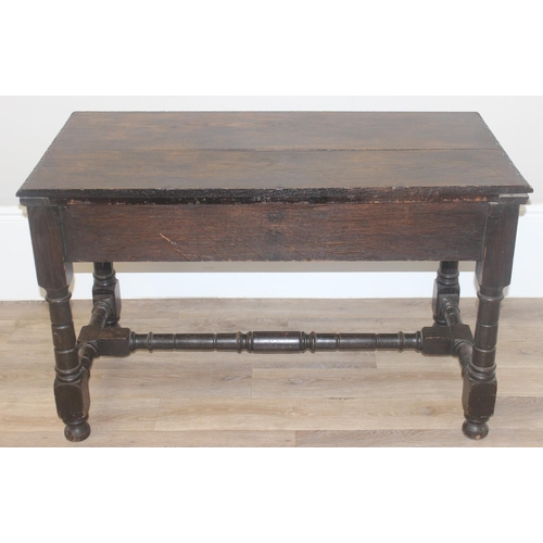 172 - A Jacobean or Carolean style carved oak hall or console table, likely early 20th century, with 2 dra... 