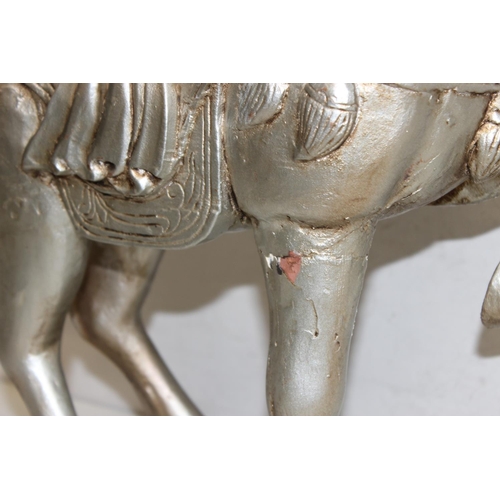 302 - A highly impressive silver painted carved wooden model of a Chinese Tang horse, likely 20th century,... 