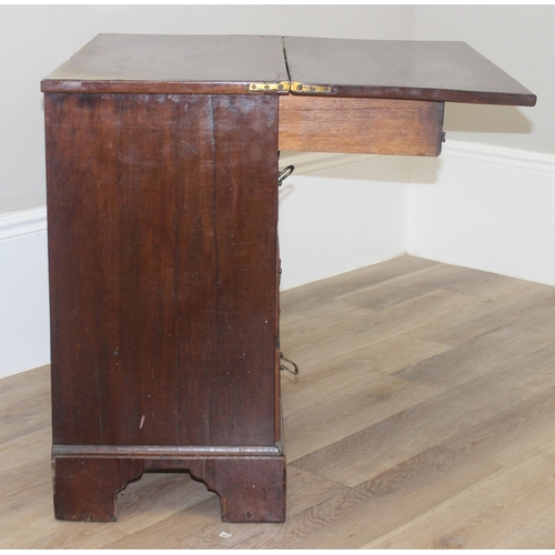 169 - A 19th century mahogany bachelors chest of drawers with fold over hinged top, 4 drawer construction ... 