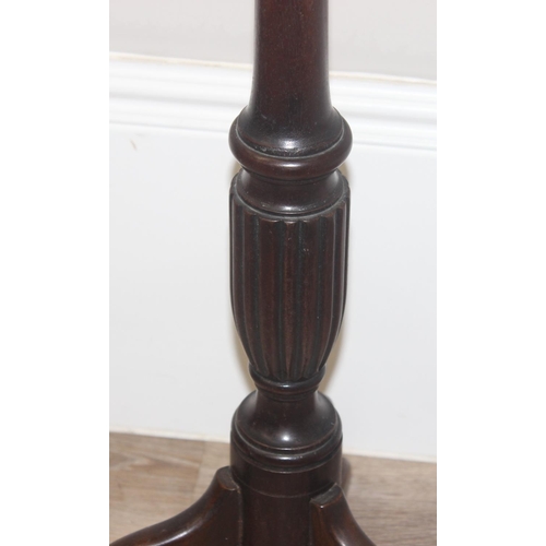 71 - An antique mahogany jardiniere or torchiere stand on tripod base, approx 31cm in diameter x 106cm ta... 