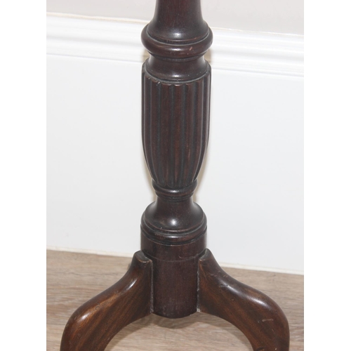 71 - An antique mahogany jardiniere or torchiere stand on tripod base, approx 31cm in diameter x 106cm ta... 