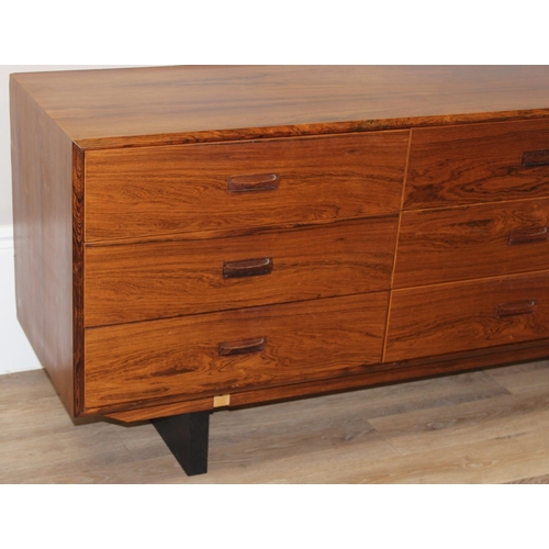 18 - A retro Rosewood veneered 9 drawer sideboard, seemingly unmarked but believed to be Canadian, approx... 