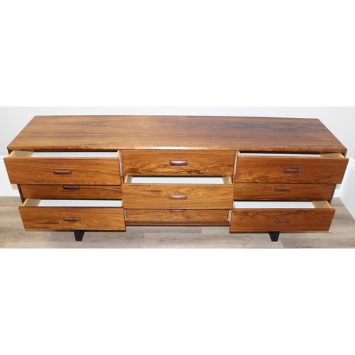 18 - A retro Rosewood veneered 9 drawer sideboard, seemingly unmarked but believed to be Canadian, approx... 