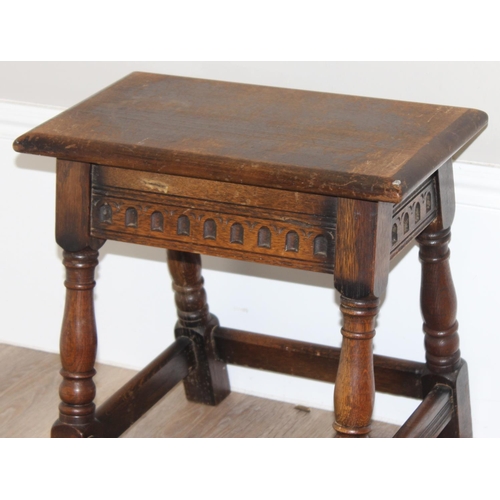 62 - An 18th century style oak coffin stool with carved details, by Old Charm, approx 45cm wide x 26cm de... 