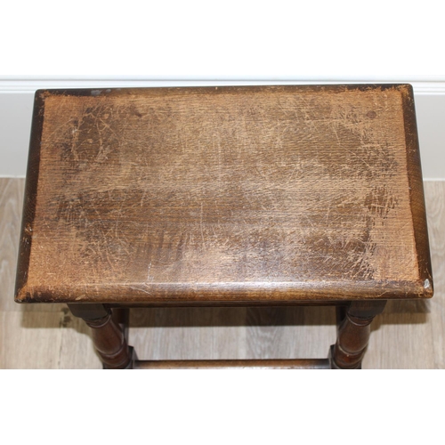 62 - An 18th century style oak coffin stool with carved details, by Old Charm, approx 45cm wide x 26cm de... 