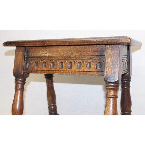 62 - An 18th century style oak coffin stool with carved details, by Old Charm, approx 45cm wide x 26cm de... 