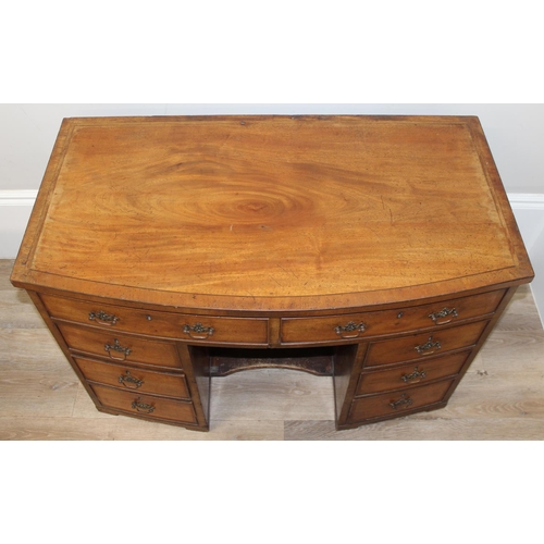 73 - A 19th century mahogany kneehole desk of 8 drawer construction with Georgian style brass handles, ap... 