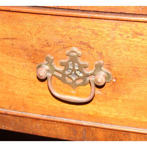 73 - A 19th century mahogany kneehole desk of 8 drawer construction with Georgian style brass handles, ap... 