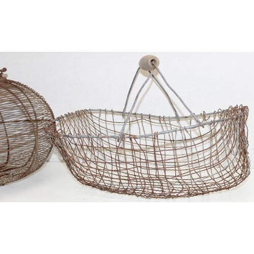 305 - 2 vintage wire baskets to incl an egg basket, largest approx 47cm W