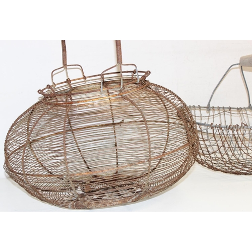 305 - 2 vintage wire baskets to incl an egg basket, largest approx 47cm W