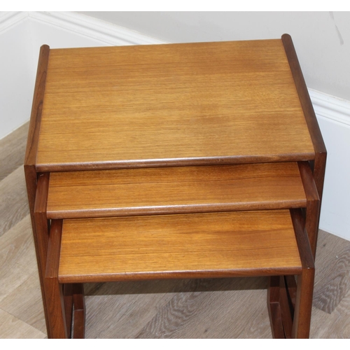 20 - A retro nest of tables, likely G-Plan but seemingly unmarked, the largest approx 54cm wide