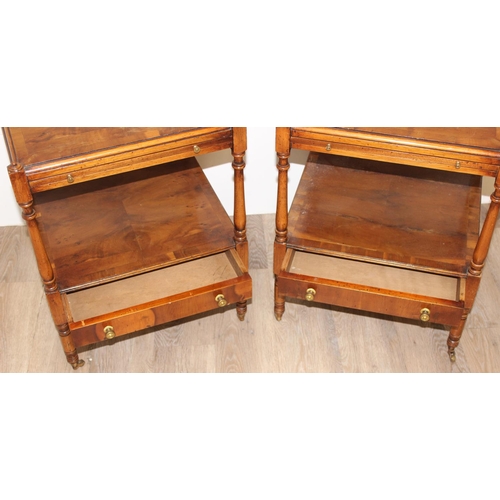 84 - A pair of antique style burrwood side tables or bedside stands with a slide out side and a single lo... 