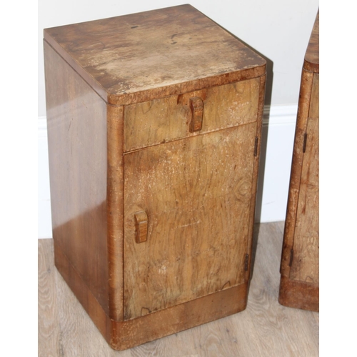 103 - A pair of Art Deco period burr walnut bedside cabinets, a single drawer over a cupboard base, each a... 