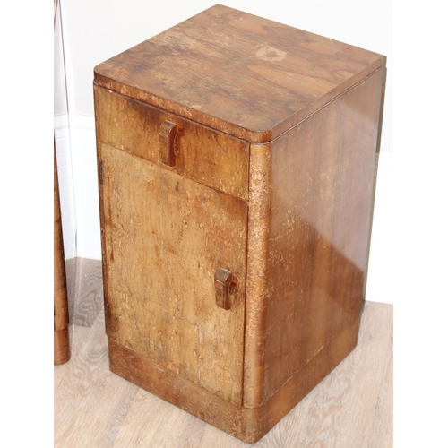 103 - A pair of Art Deco period burr walnut bedside cabinets, a single drawer over a cupboard base, each a... 